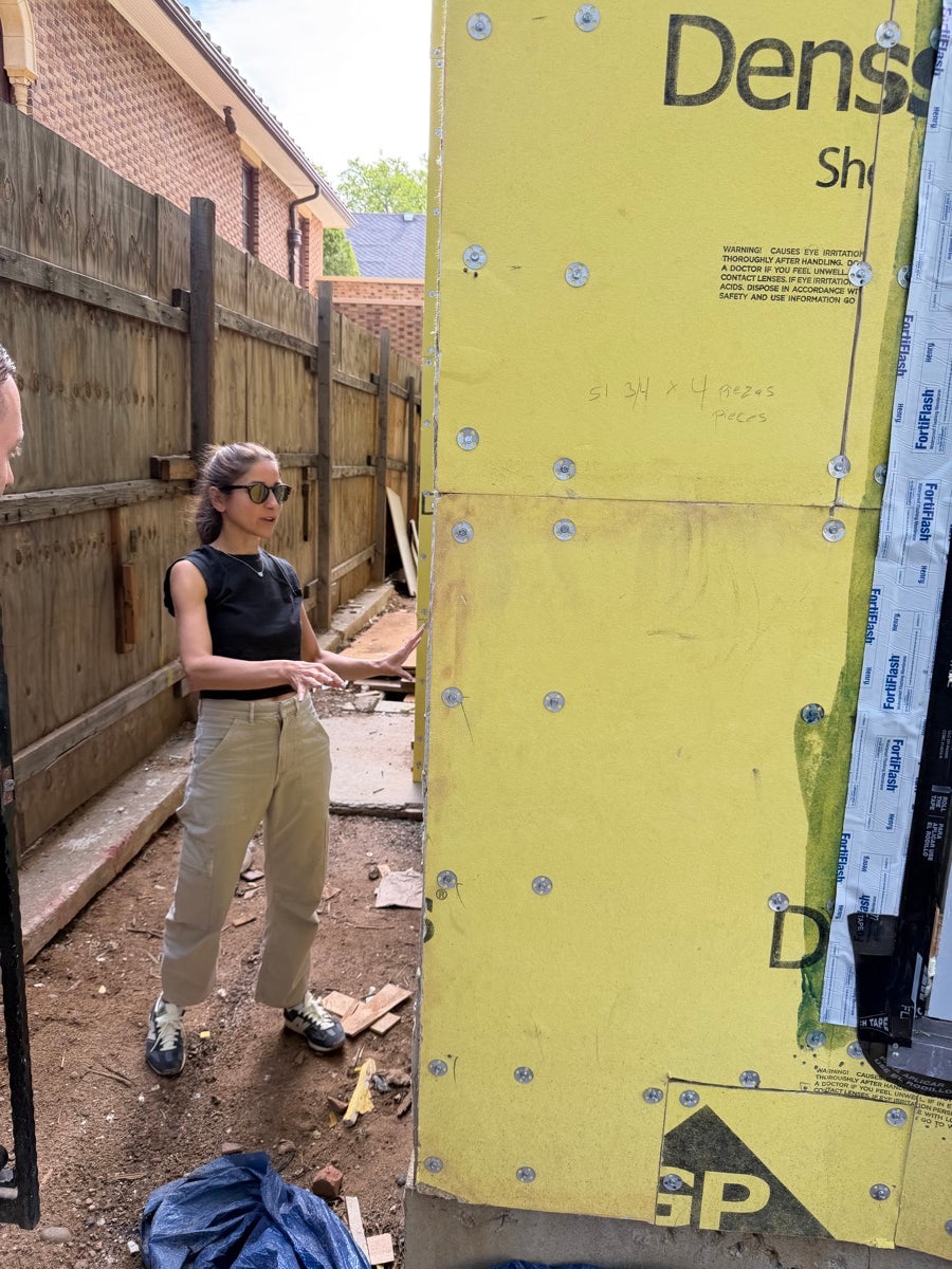 Exterior sheathing and window flashing, mid-build